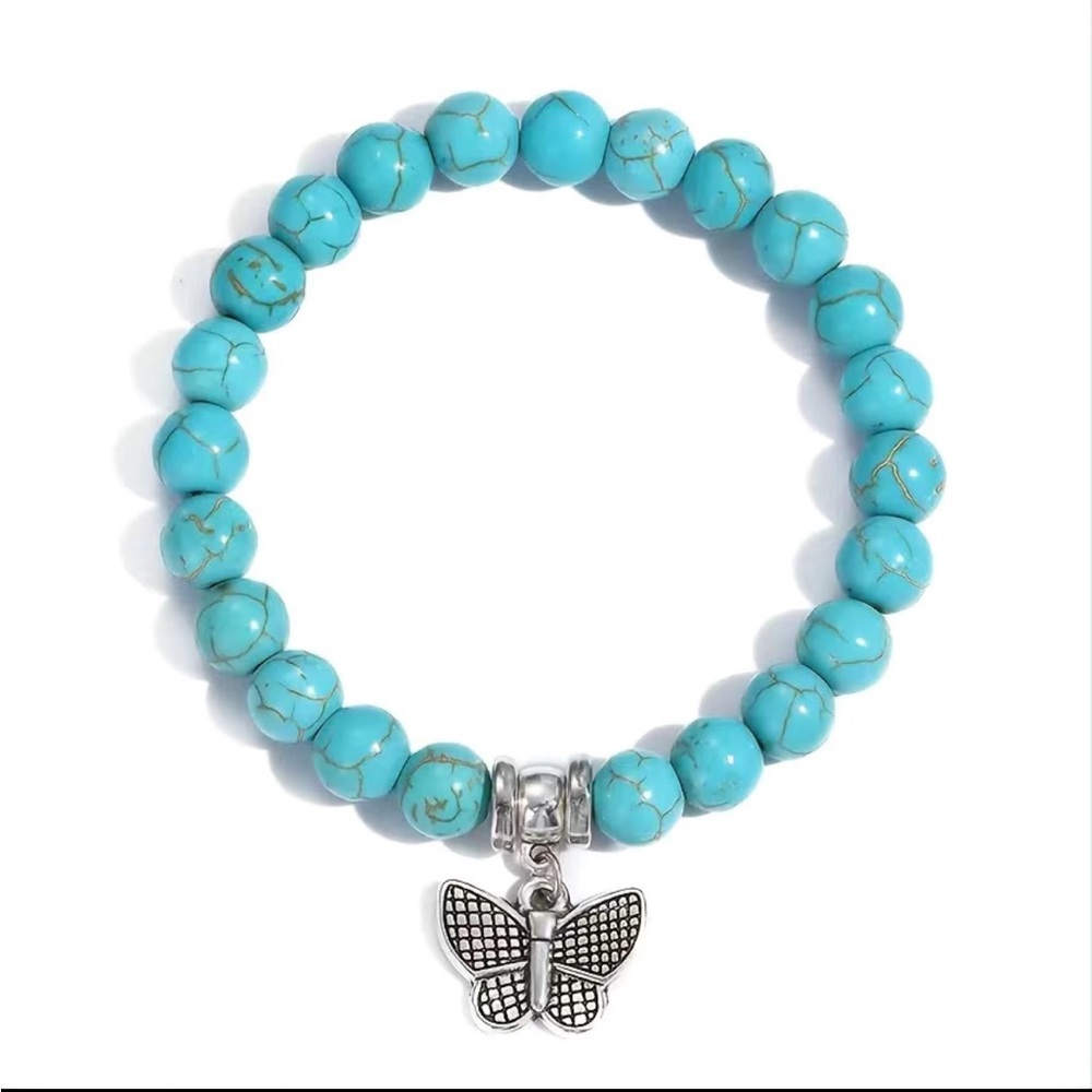 Turquoise Bracelet with Silver Tone Butterfly Charm